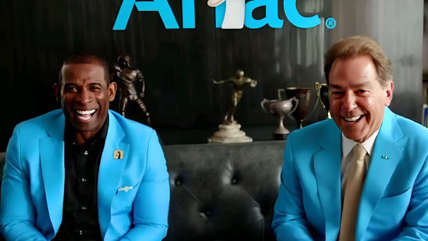 Deion Sanders and Nick Saban on set of Aflac commercial